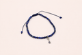 Pulseira pedras e chave em ouro