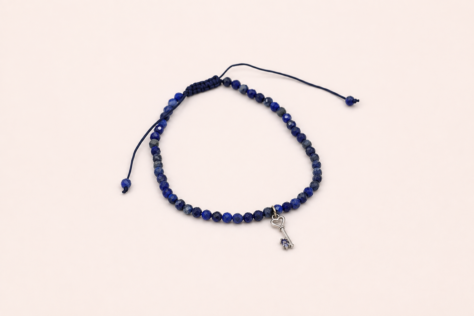 Pulseira pedras e chave em ouro