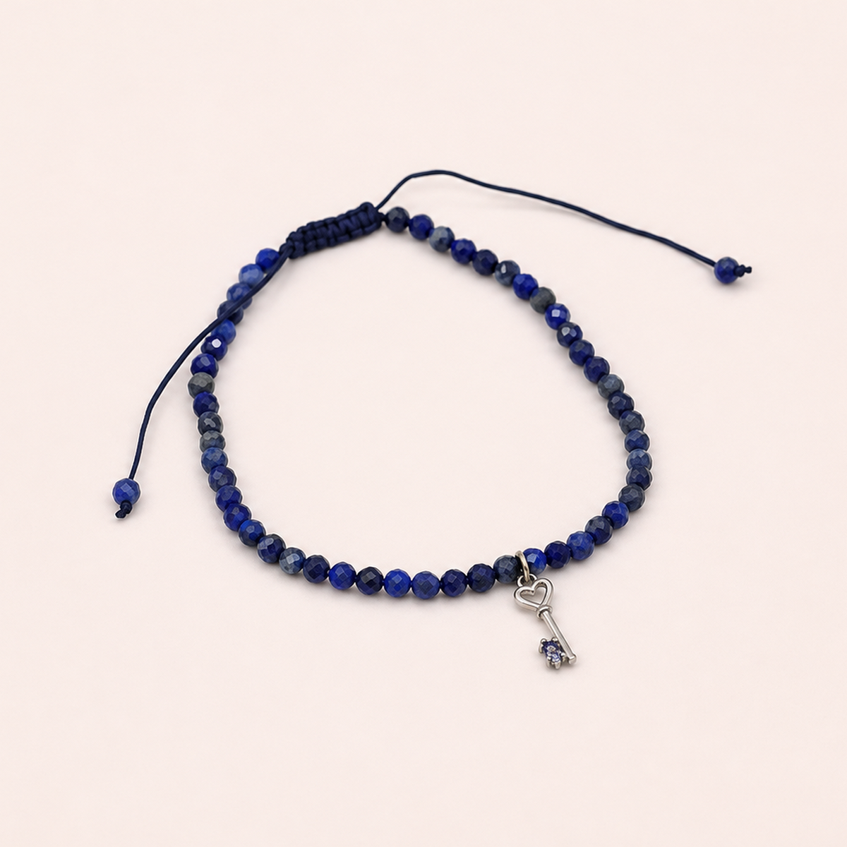 Pulseira pedras e chave em ouro